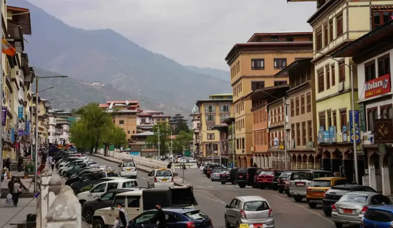 things to do in bhutan,tourist sites in Bhutan,Paro Taktsang Monastery,Tiger’s Nest,Tshechu Festival,Streets of Thimphu,Tashichho Dzong,Bhutan Food Experience,Ema Datshi,Savor Momos And Thukpa,Ara and Suja Bhutan,Bhutan Adventure Experience,Jomolhari Base Camp,Pho Chhu River,Raft in the Pho Chhu River,Mountain Biking Expedition,Phobjikha Valley,Observe Black-necked Cranes,Dochula Pass,scenic drive,Bumthang Valley,nature walk,Kyichu Lhakhang temple