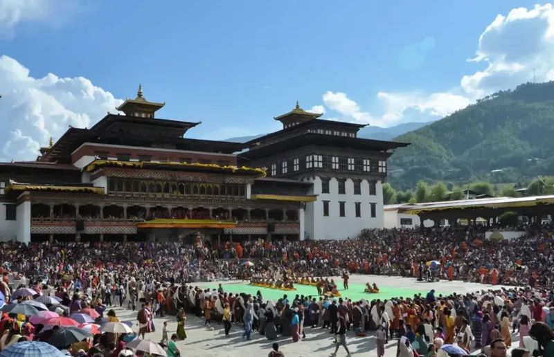 things to do in bhutan,tourist sites in Bhutan,Paro Taktsang Monastery,Tiger’s Nest,Tshechu Festival,Streets of Thimphu,Tashichho Dzong,Bhutan Food Experience,Ema Datshi,Savor Momos And Thukpa,Ara and Suja Bhutan,Bhutan Adventure Experience,Jomolhari Base Camp,Pho Chhu River,Raft in the Pho Chhu River,Mountain Biking Expedition,Phobjikha Valley,Observe Black-necked Cranes,Dochula Pass,scenic drive,Bumthang Valley,nature walk,Kyichu Lhakhang temple