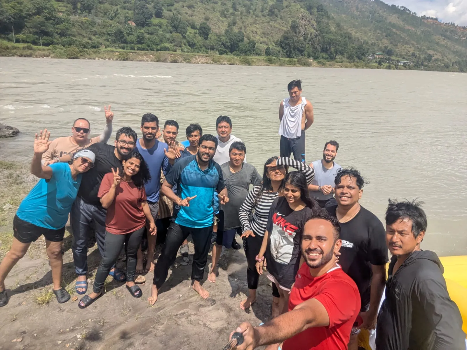 Water smiling on the Bhutan group trip with One in the Orange Jacket.