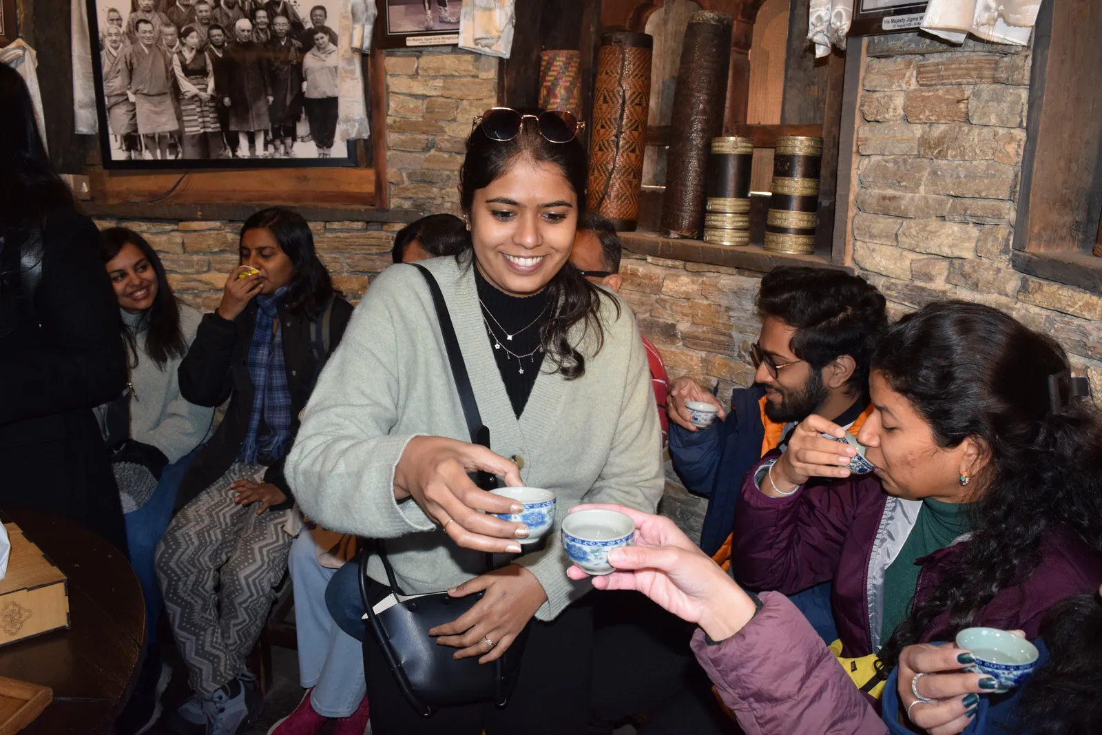 Enjoying tea on the Bhutan group trip with One in the Orange Jacket.