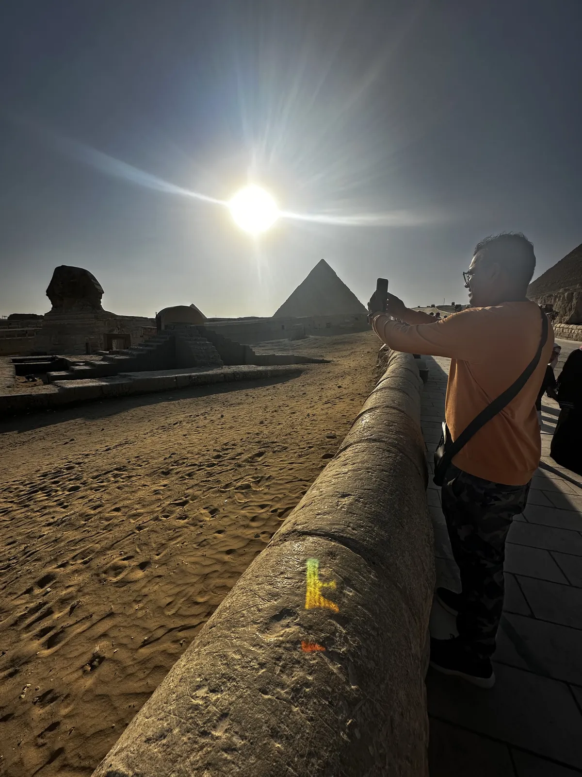 Sun flare obscures on the Egypt & Jordan group trip with One in the Orange Jacket.