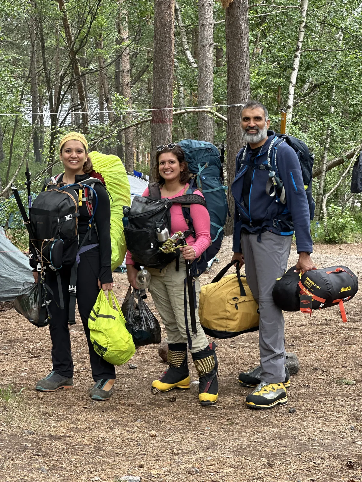 Hiking adventure hikers gear ready on the Mount Elbrus group trip with One in the Orange Jacket.