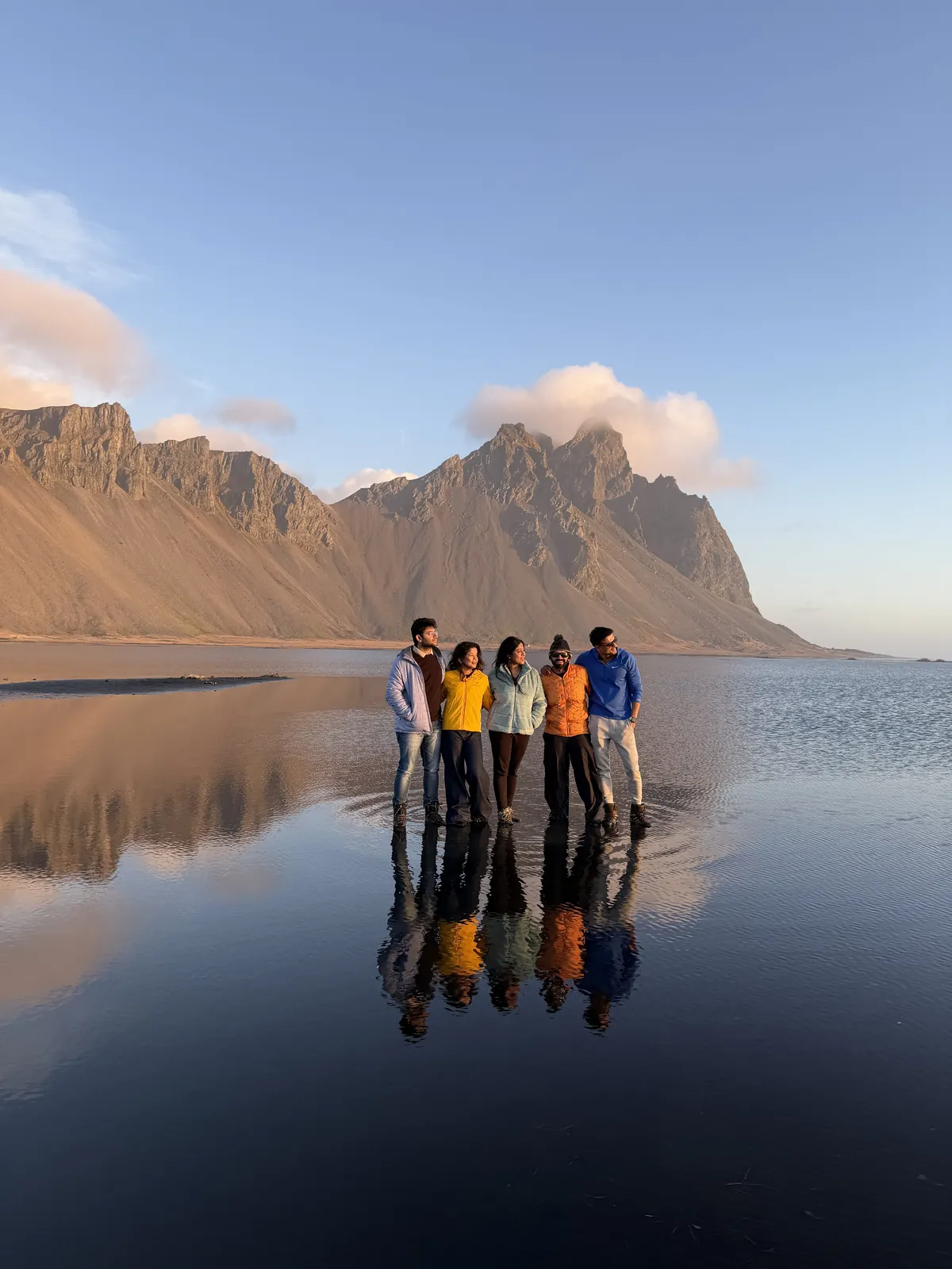 Water excellent reflections on the Iceland group trip with One in the Orange Jacket.