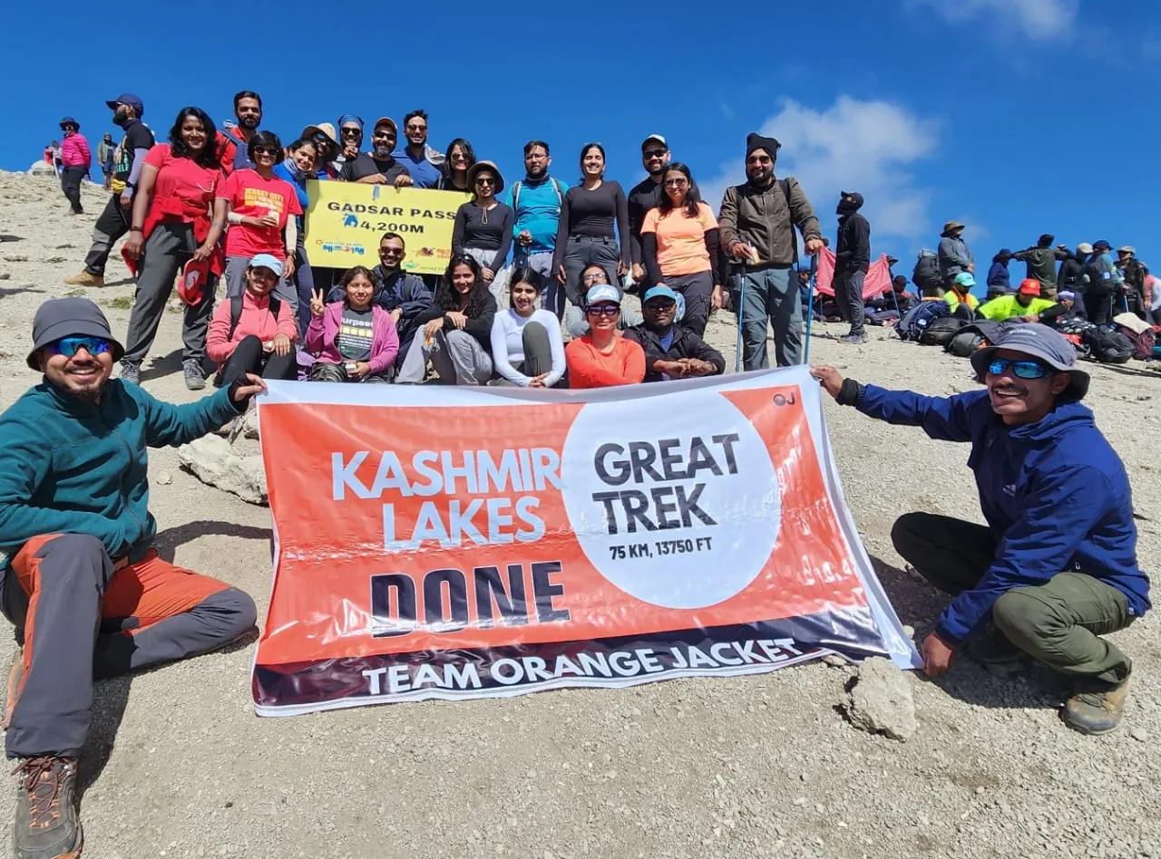 Mountain banner blue sky on the Kashmir Great Lakes group trip with One in the Orange Jacket.