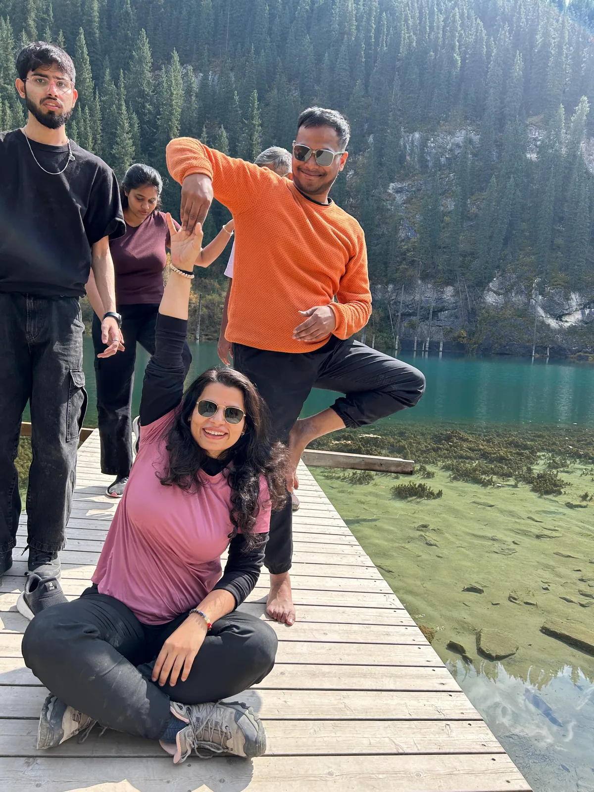 Water friends enjoying scenic on the Kazakhstan group trip with One in the Orange Jacket.