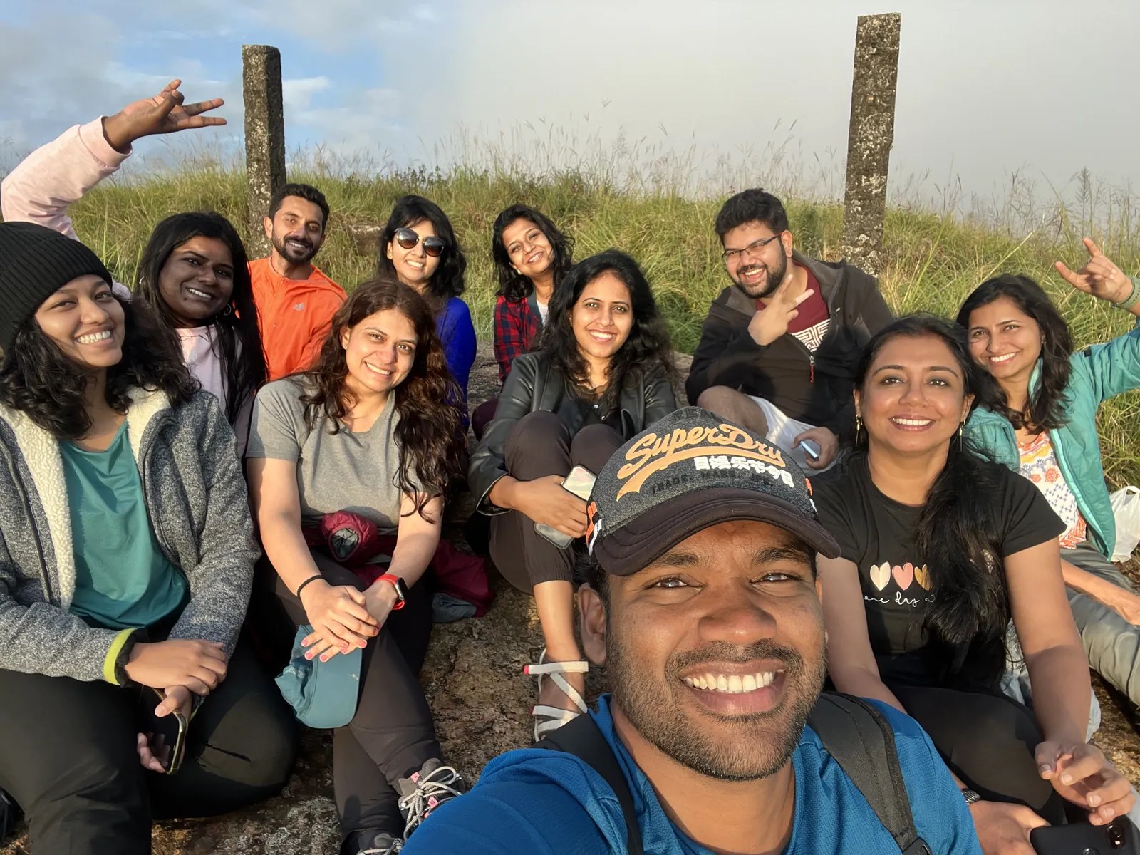 Smiling faces fun on the Meghalaya group trip with One in the Orange Jacket.
