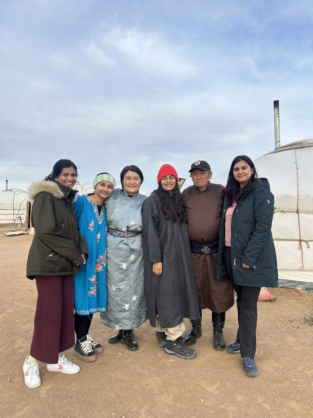 Traditional clothing on the Mongolia group trip with One in the Orange Jacket.