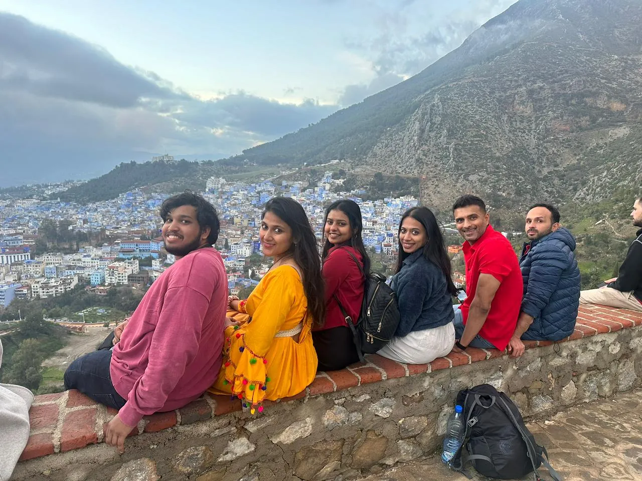 Urban mountain blue city on the Morocco group trip with One in the Orange Jacket.