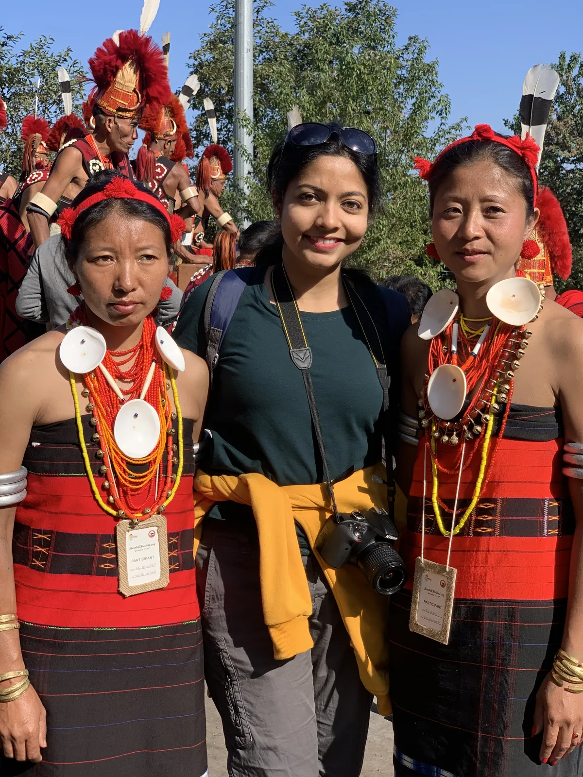 Smiles traditional attire on the Nagaland group trip with One in the Orange Jacket.