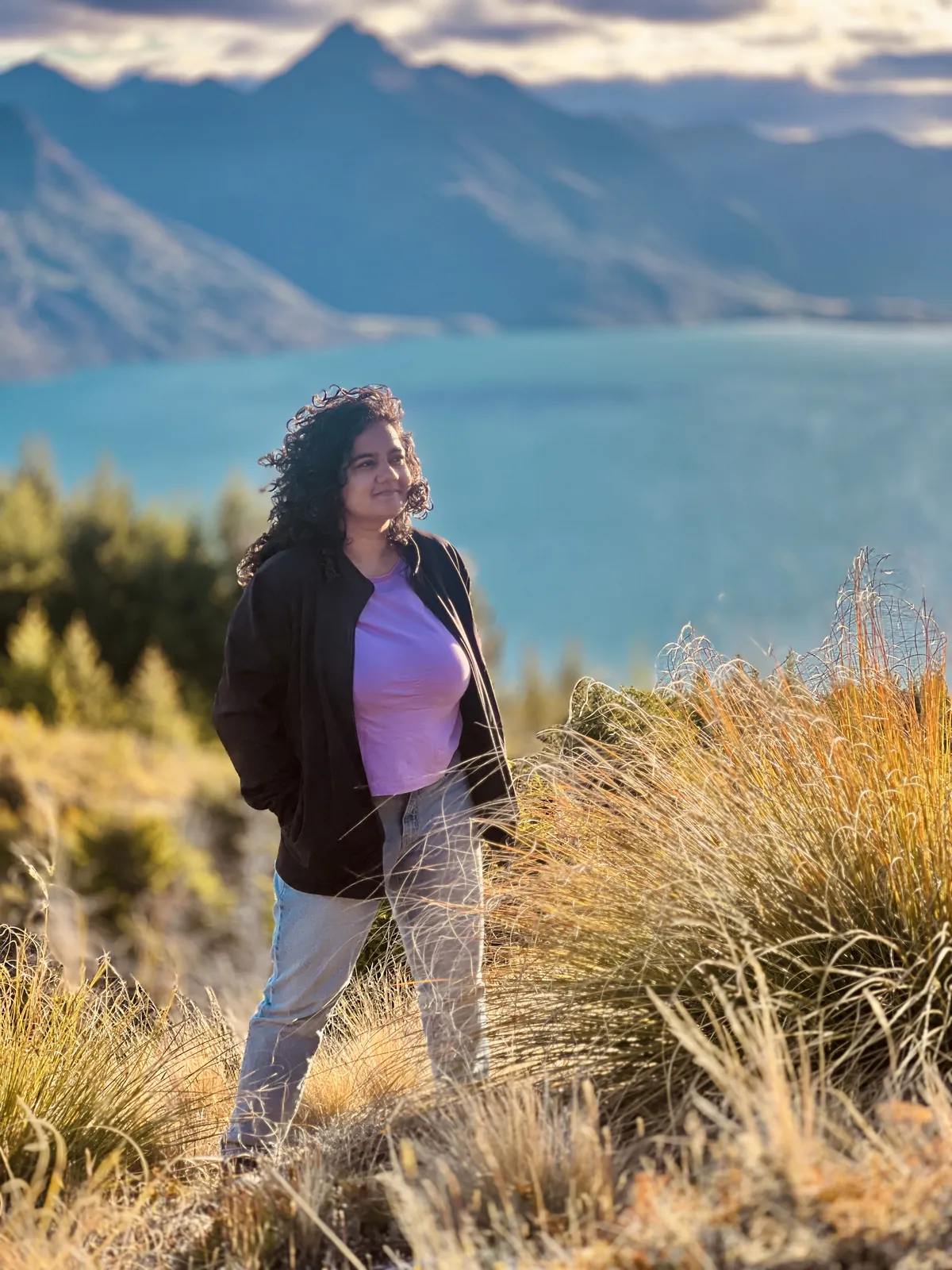 Posing scenic on the New Zealand group trip with One in the Orange Jacket.