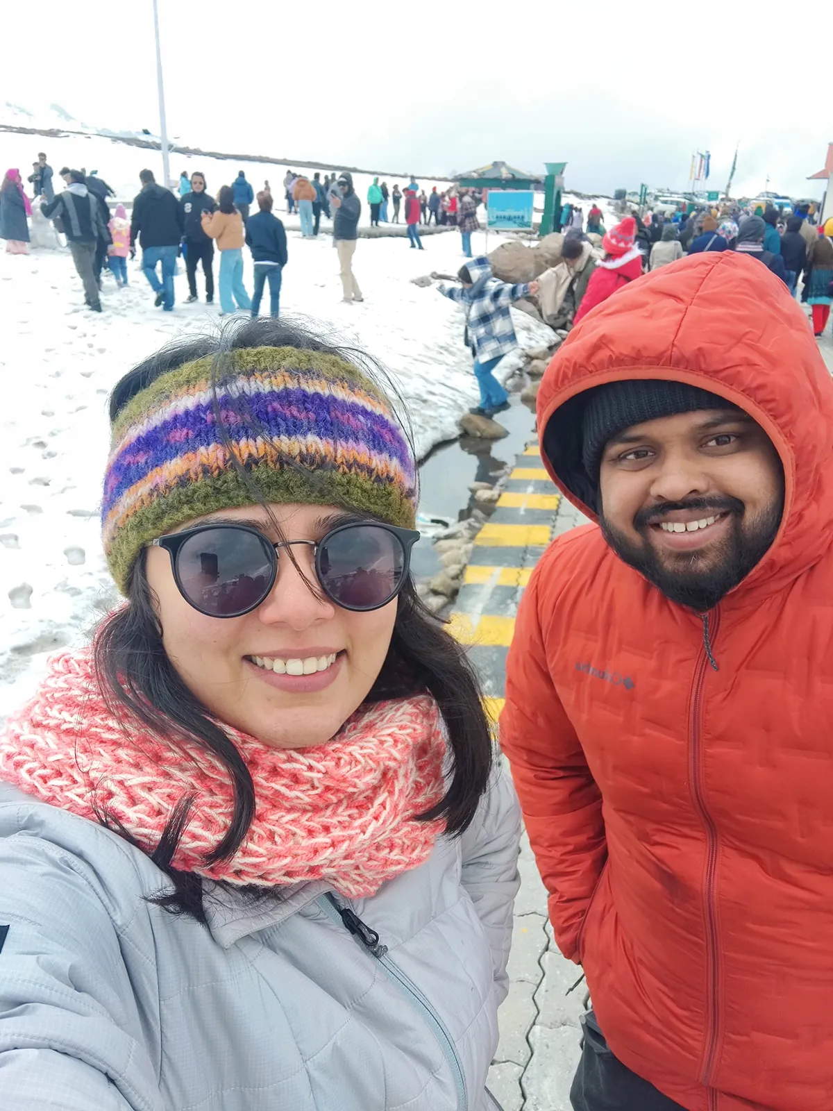 Selfie travelers on the Tawang group trip with One in the Orange Jacket.