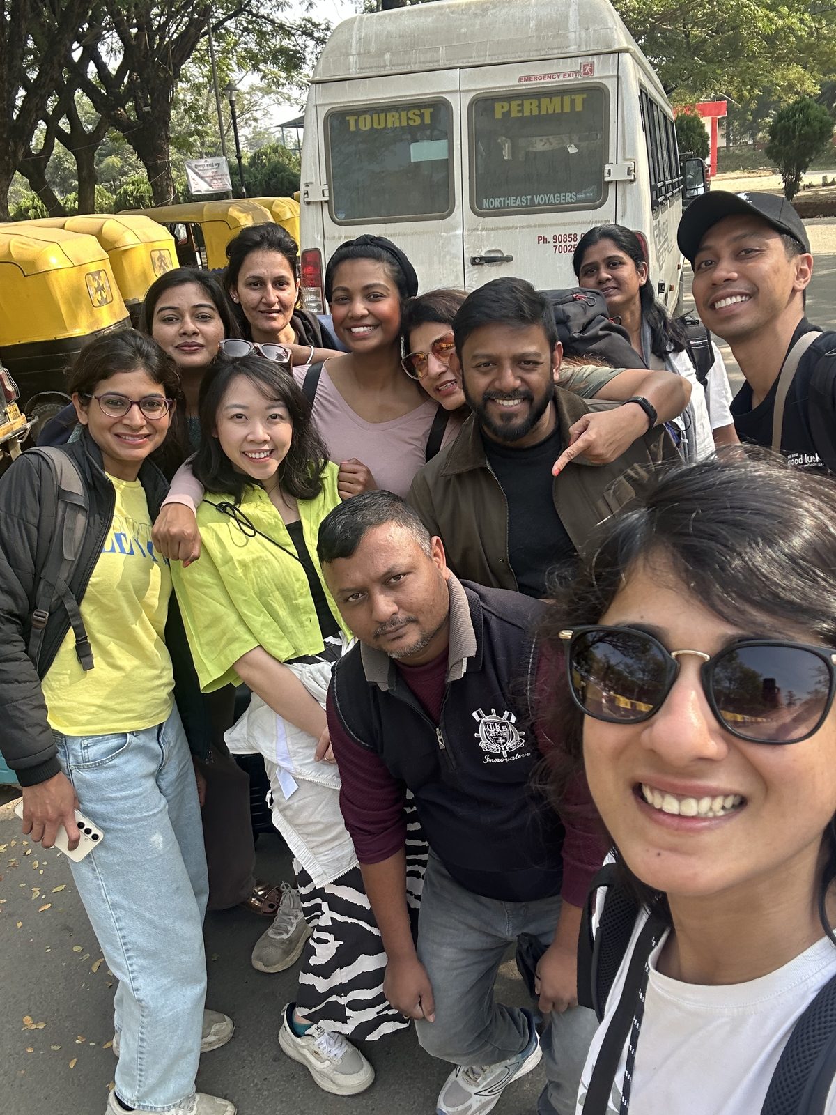 OJ group selfie in front of the tour van on the last morning