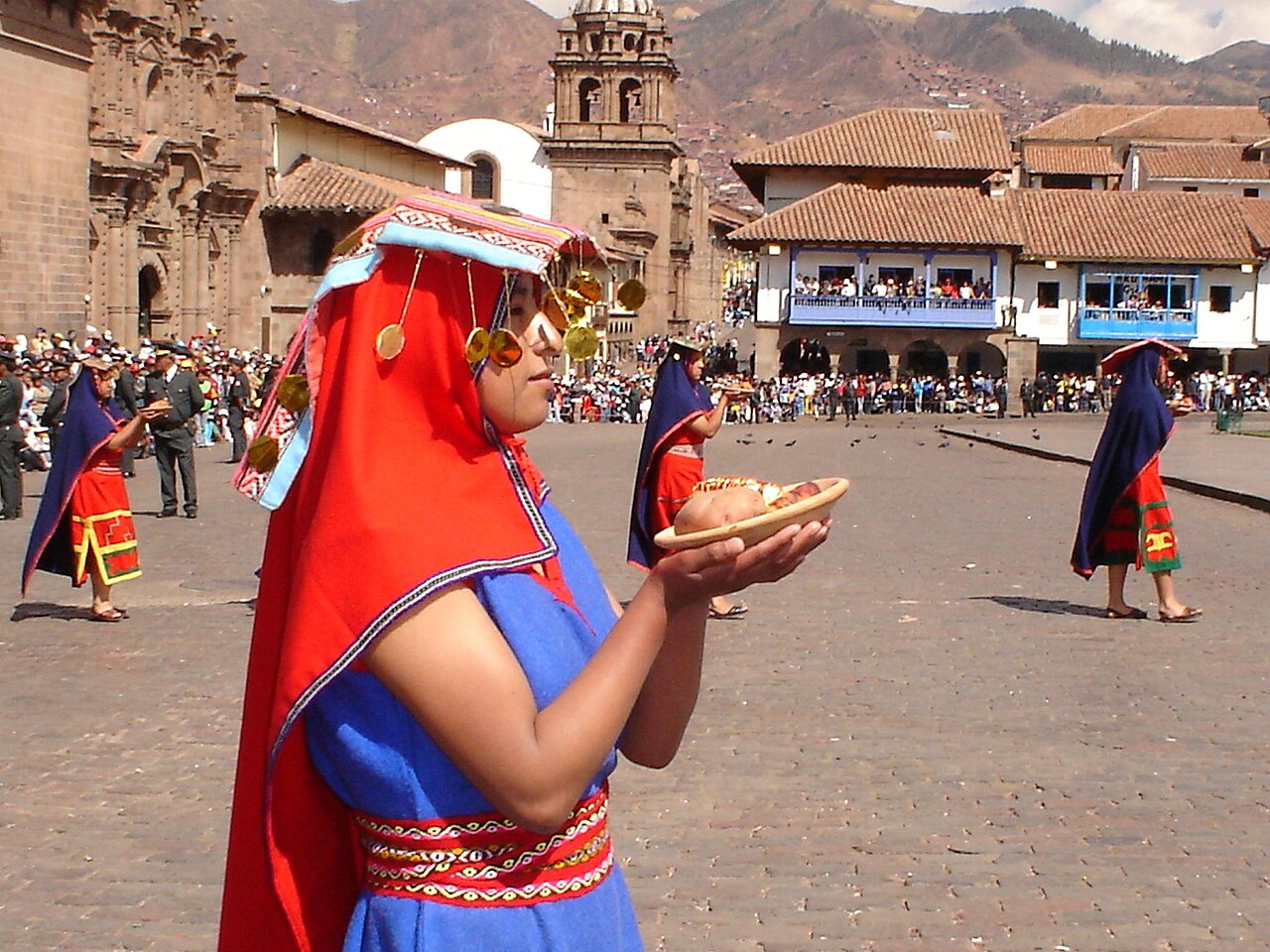 Costumed performers reenacting the Inca Inti Raymi festival above Cusco, Peru