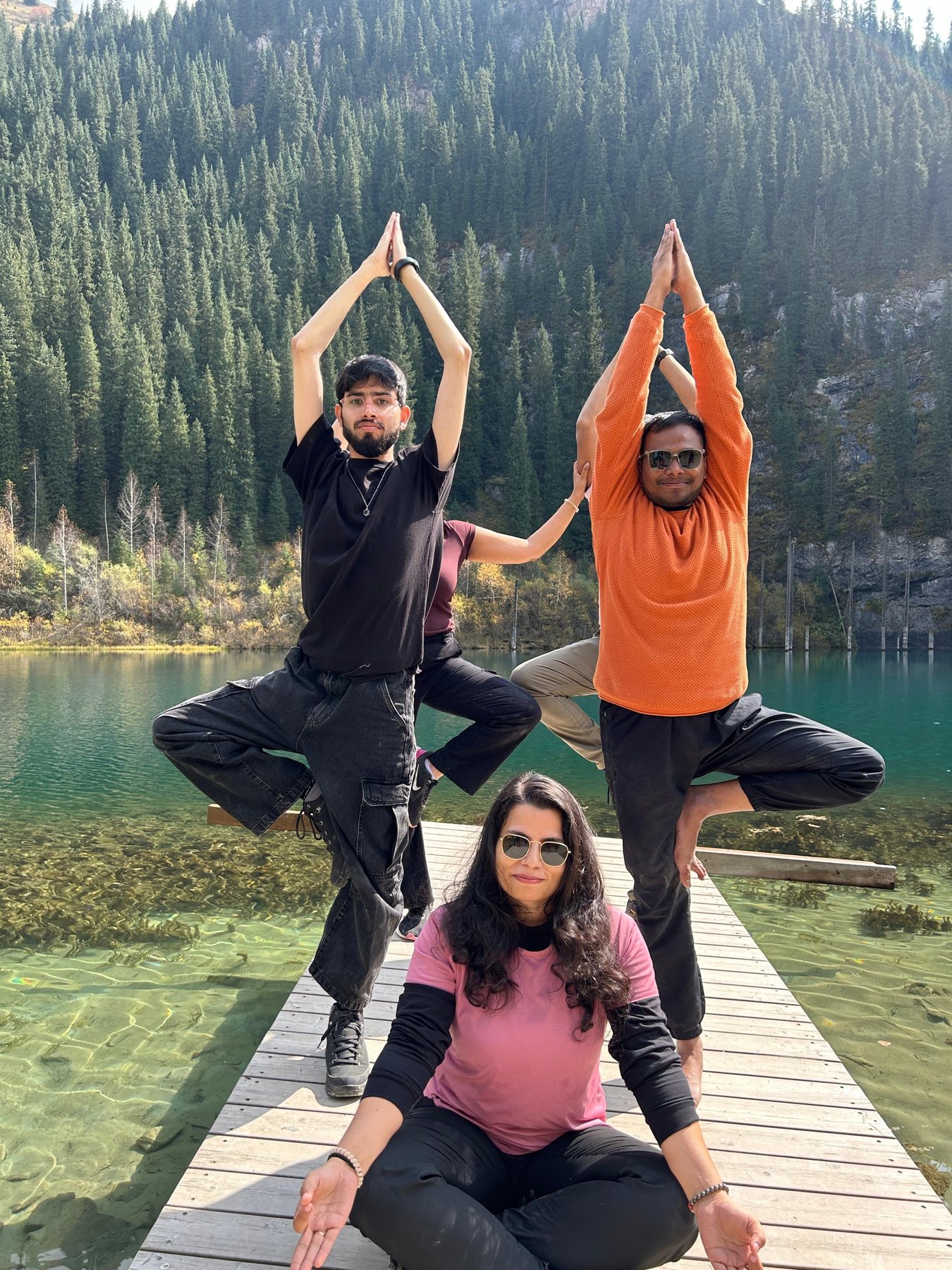 Yoga on the jetty at Kolsai Lake