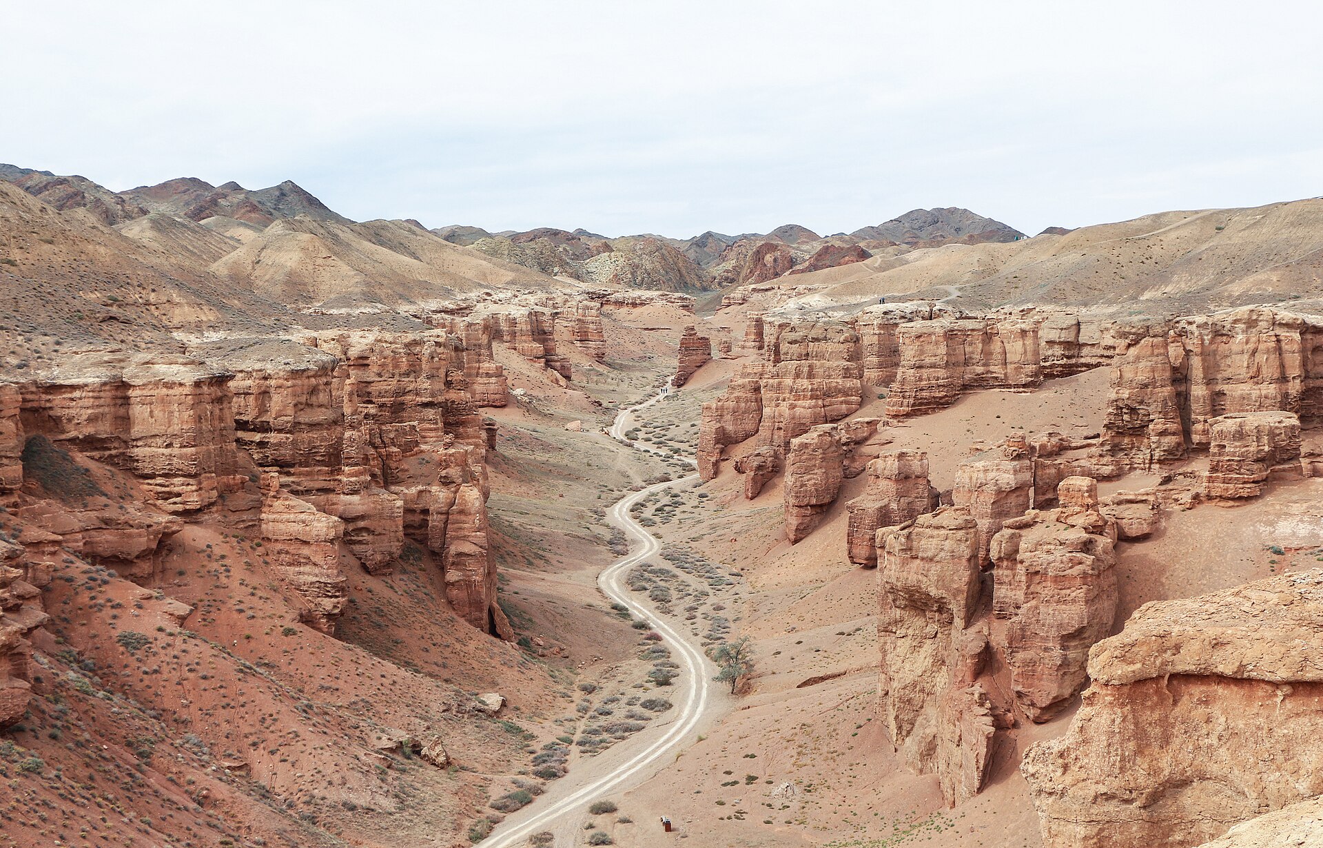 Charyn Canyon road winding through red sandstone
