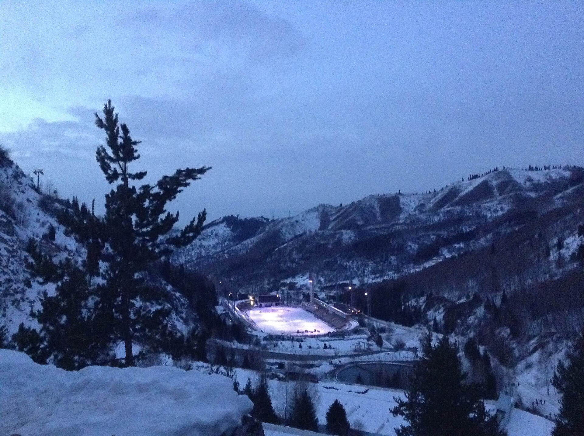 Medeu valley and ice rink in winter twilight, below Shymbulak