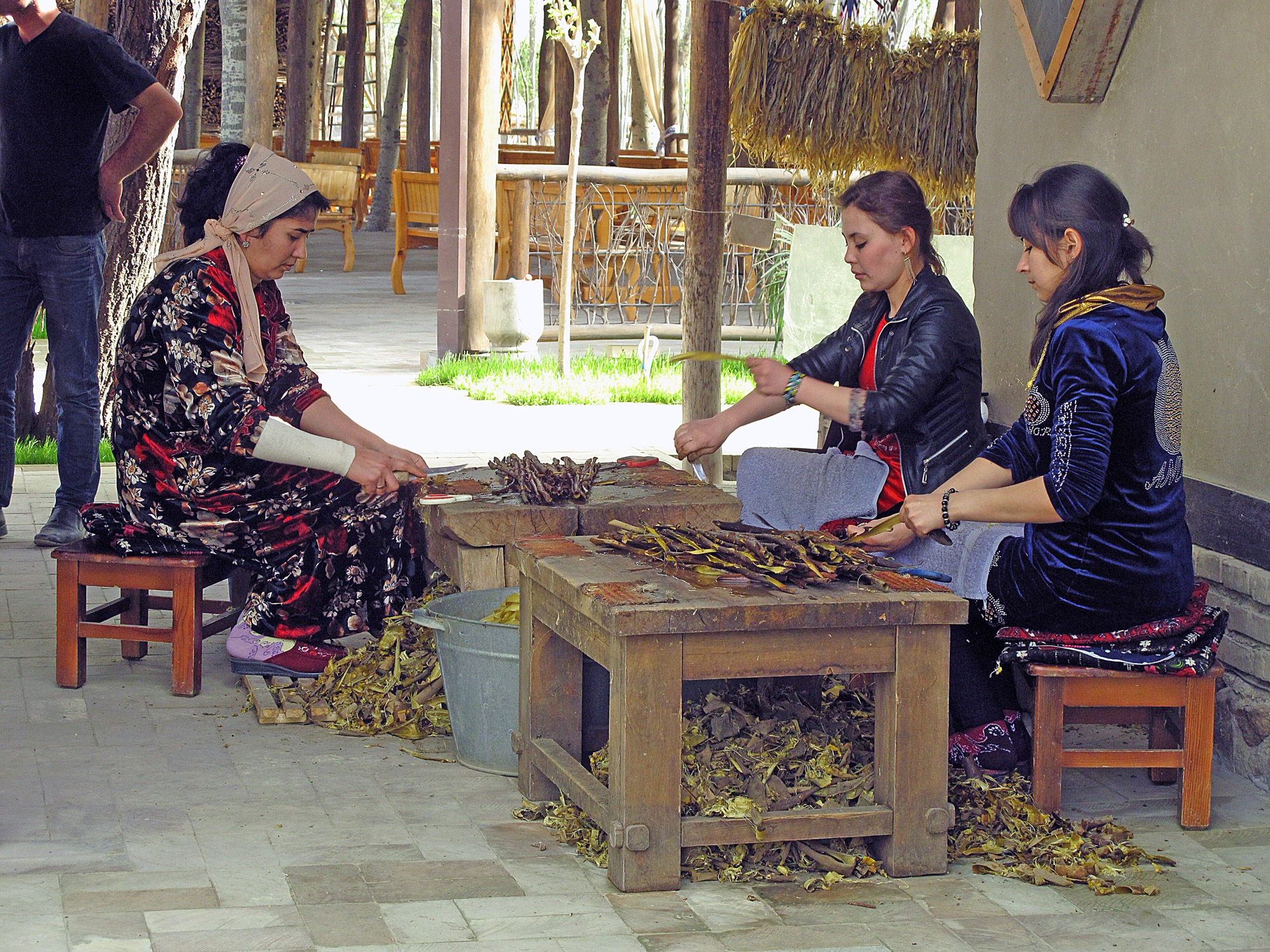Stripping mulberry bark at the Konigil paper mill outside Samarkand