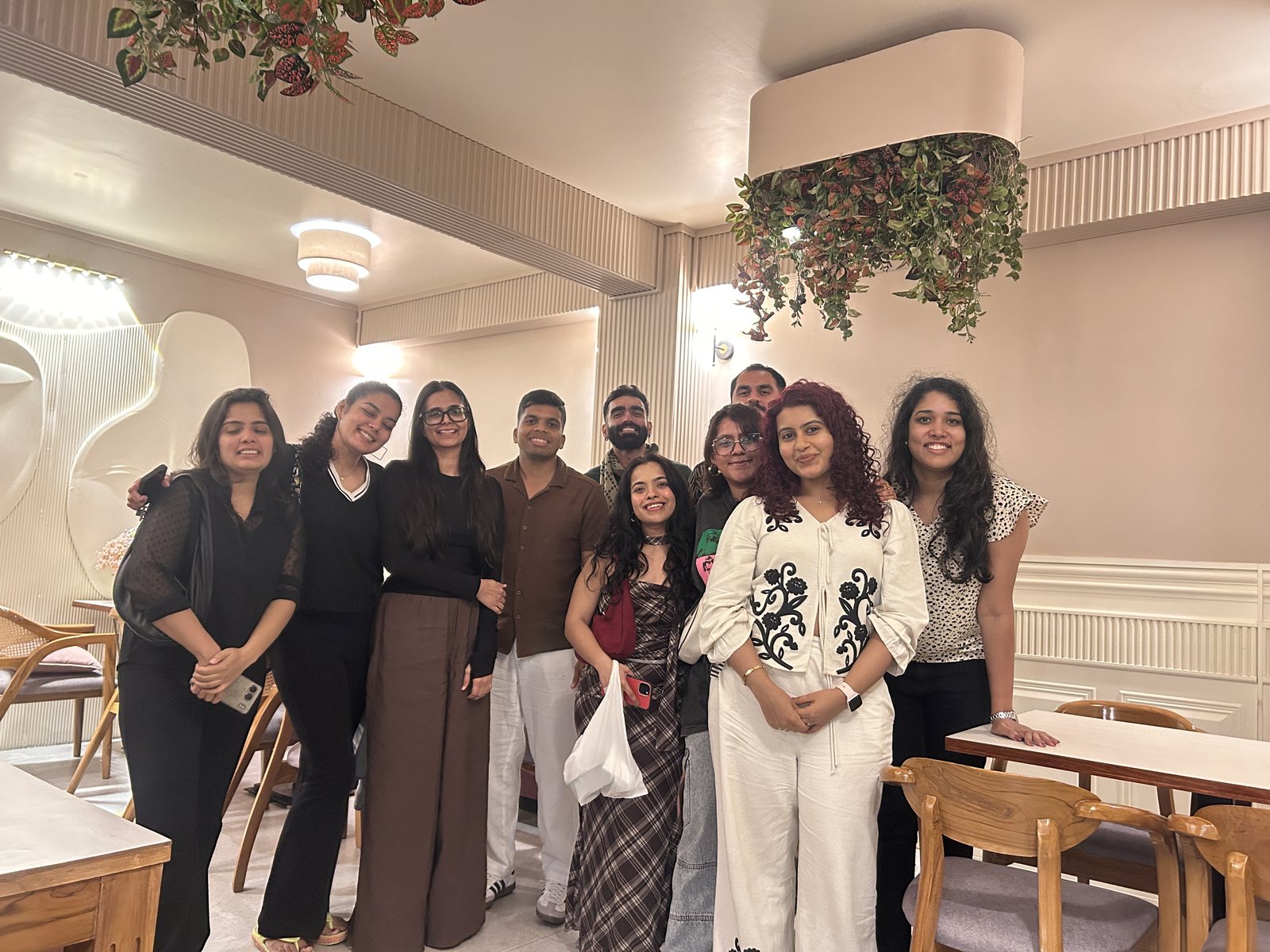 Meghalaya, Day 8, head back to Shillong: group of nine at a Shillong cafe dinner