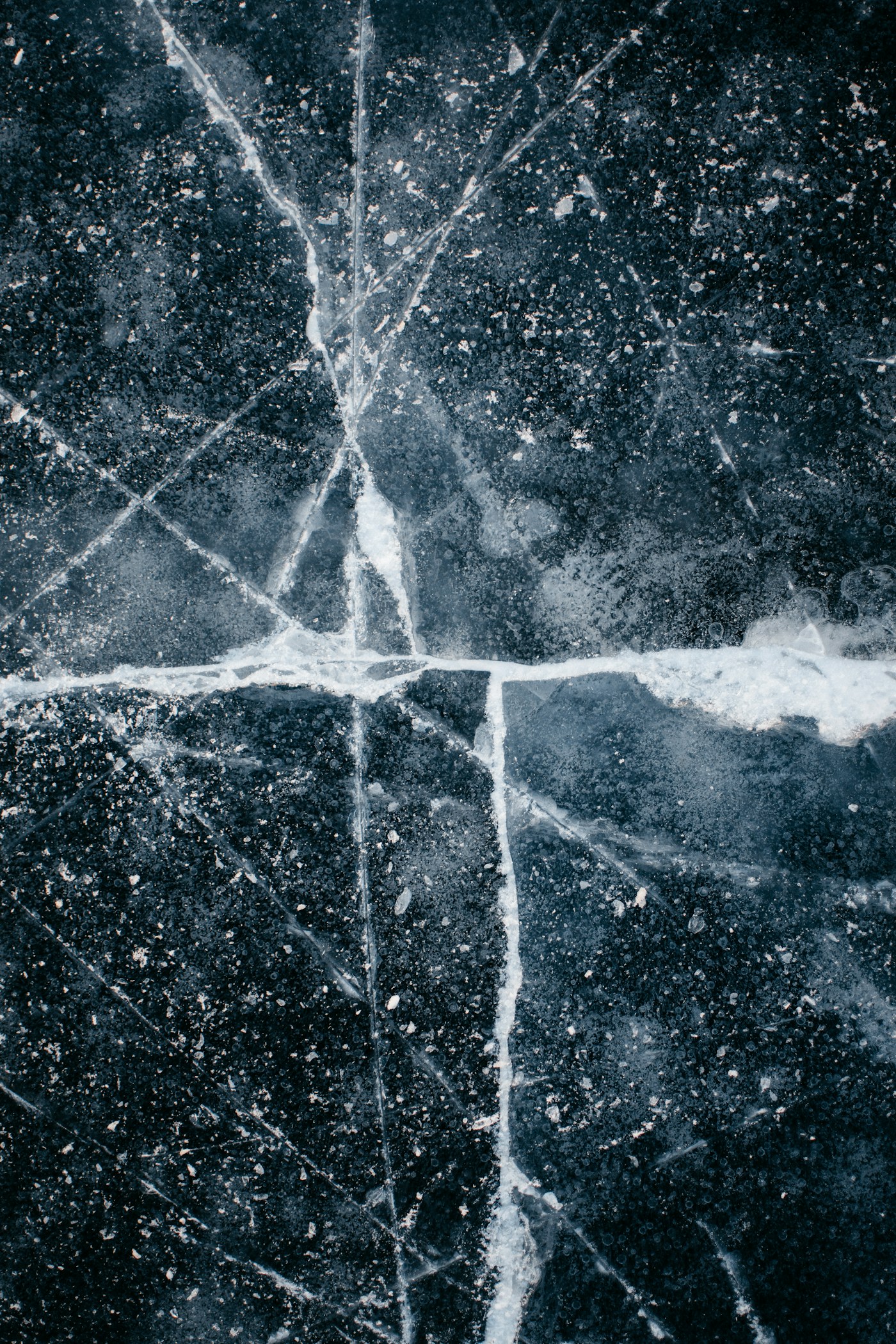 Cracked ice on the lake surface