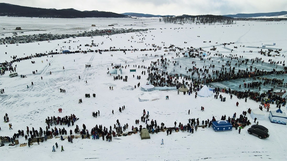 Crowd around the ice arena at the Khuvsgul Ice Festival, seen from above