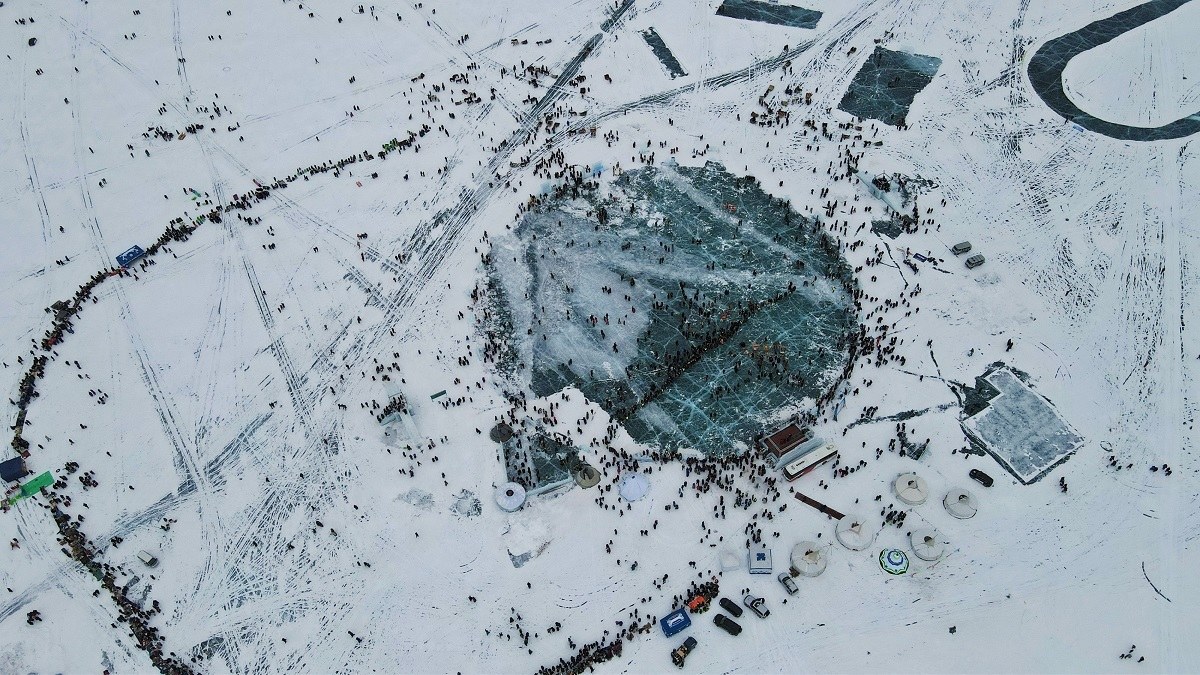 The festival ice arena on Lake Khuvsgul with the crowd around it, from above