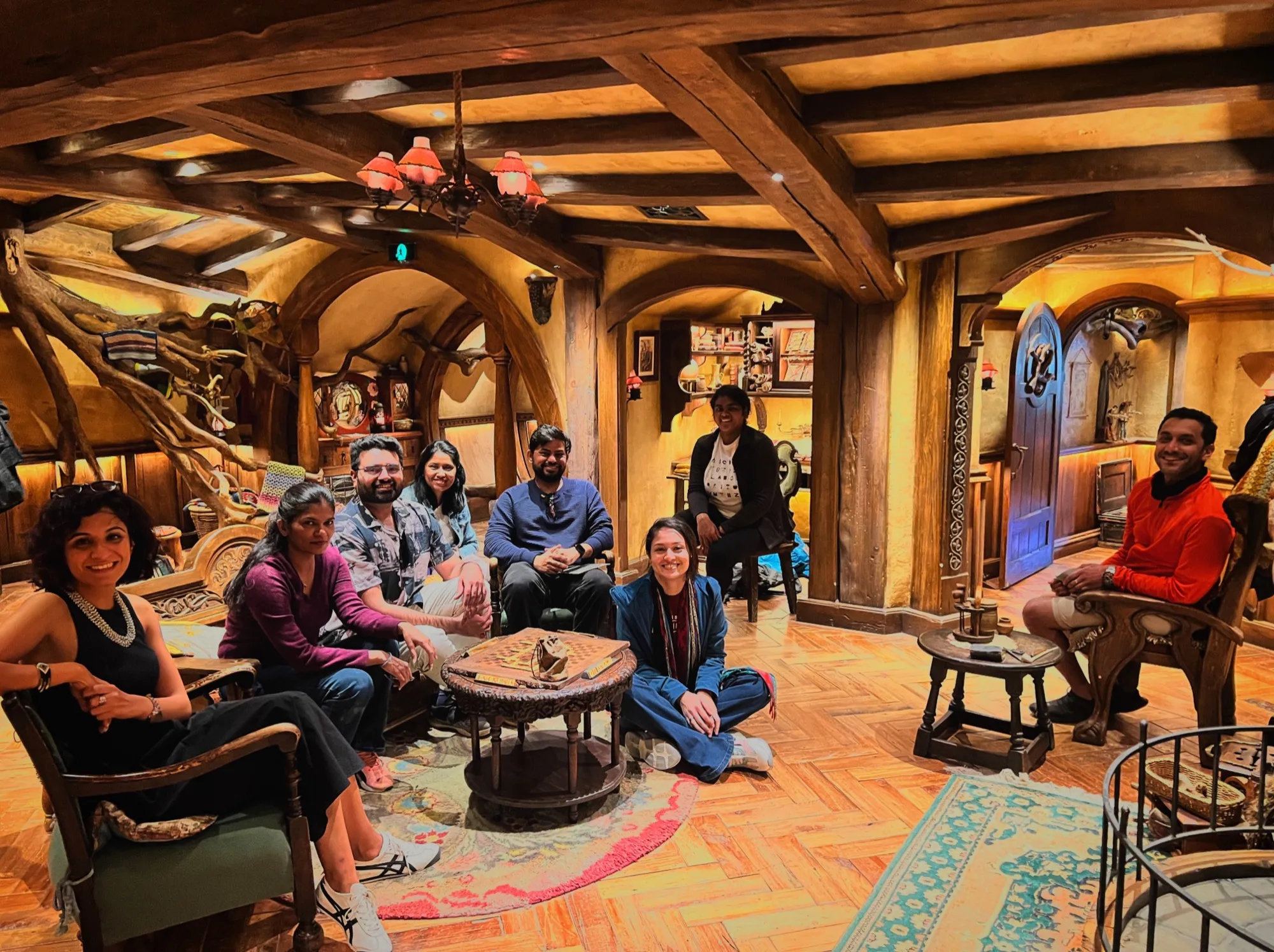 New zealand day 3 group travelers inside cozy interior