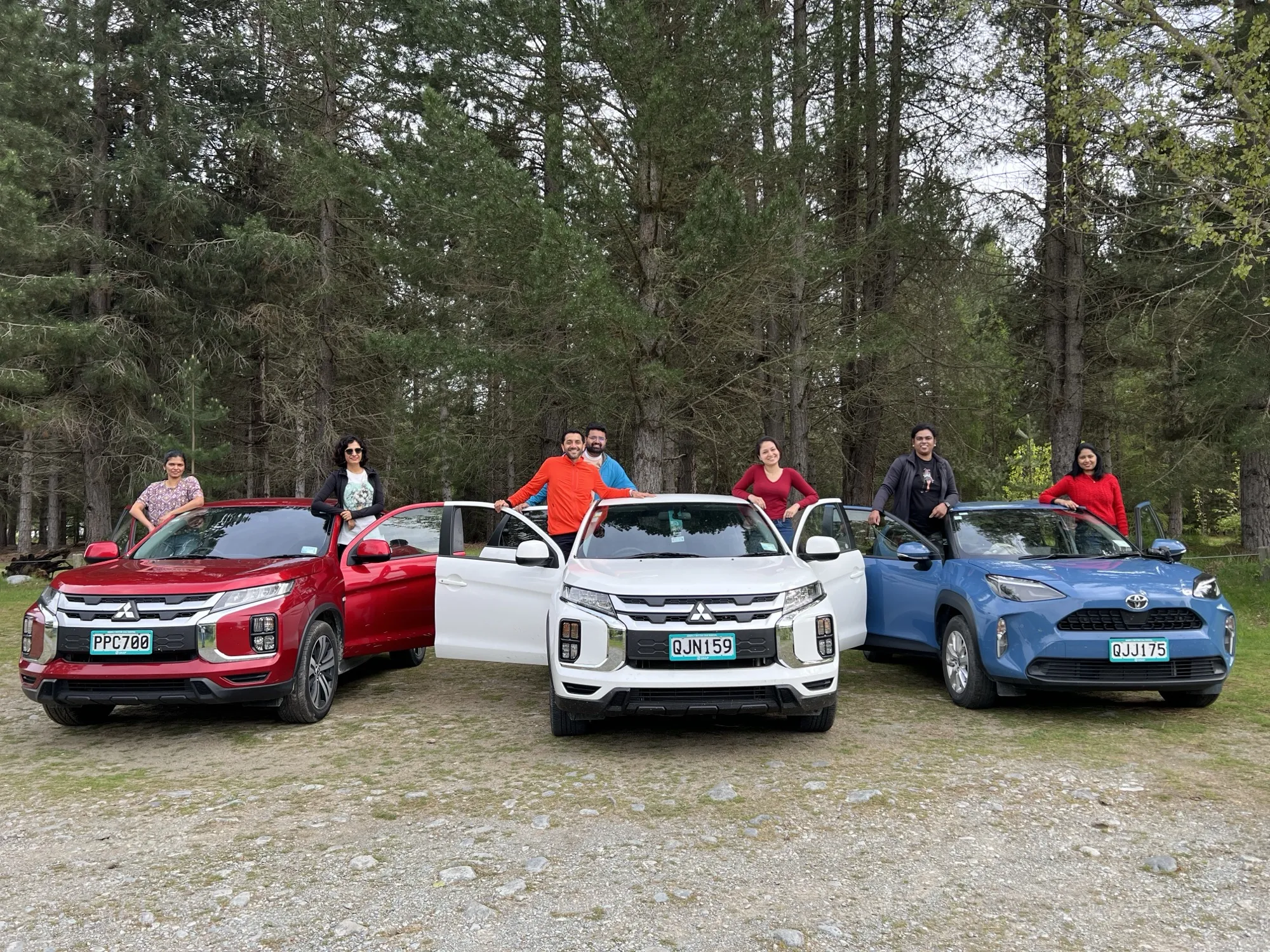 New zealand day 7 group travelers cars forest setting
