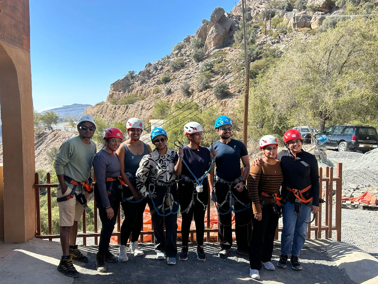 The OJ crew in helmets and harnesses, ready for the via ferrata in the Al Hajar mountains