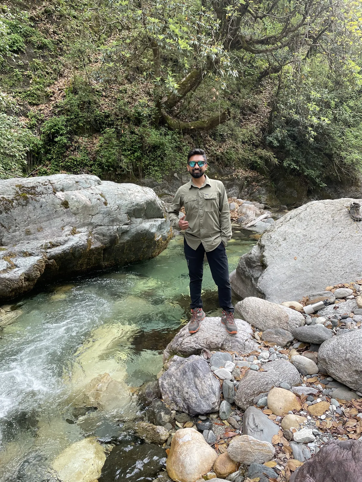 OJ tripper by a clear pool on the Neel Ganga