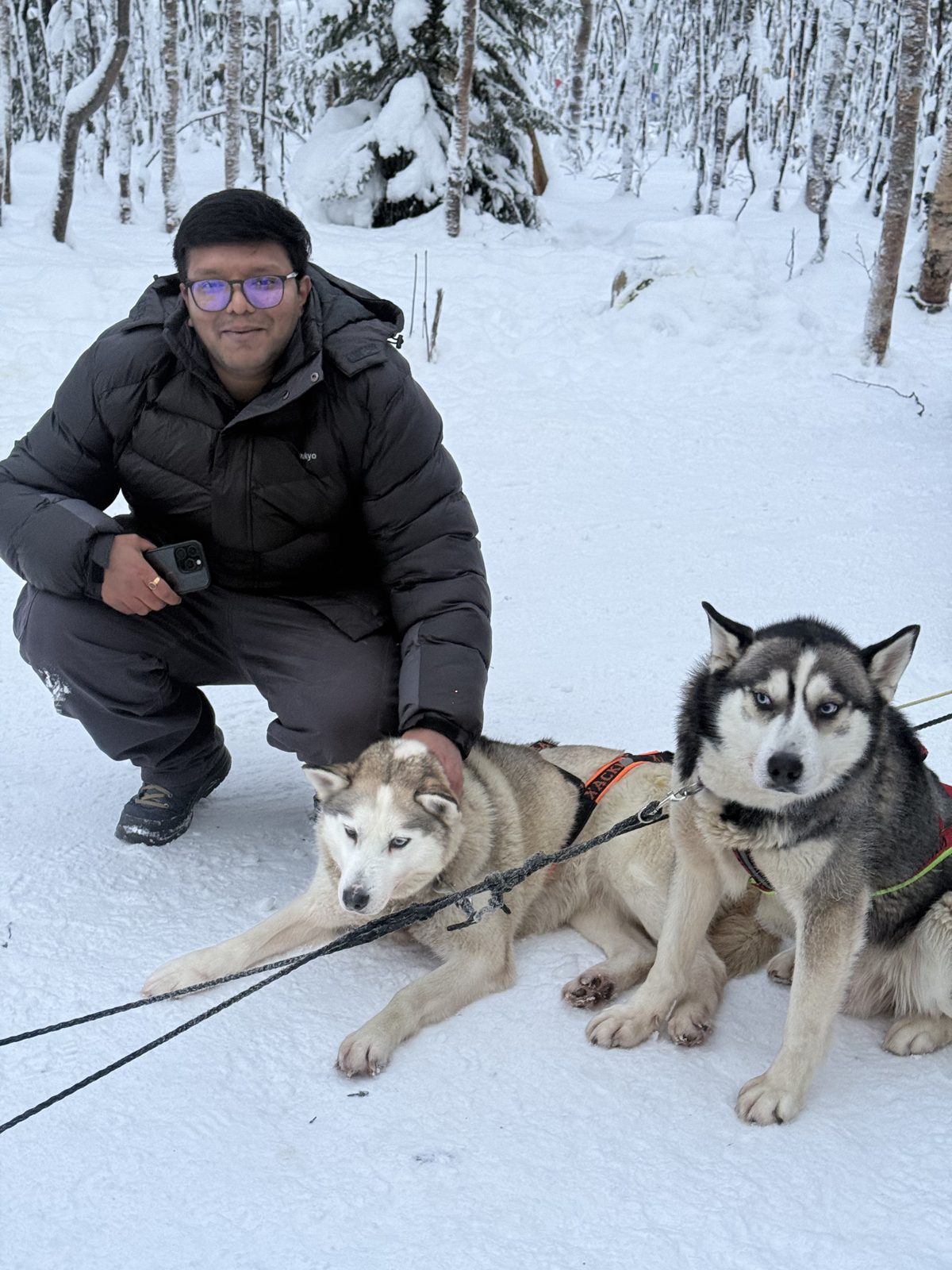 OJ tripper with the huskies at the farm