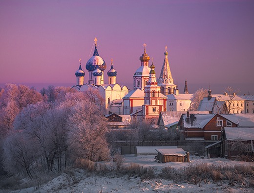 Suzdal's kremlin domes at a frosty winter sunrise
