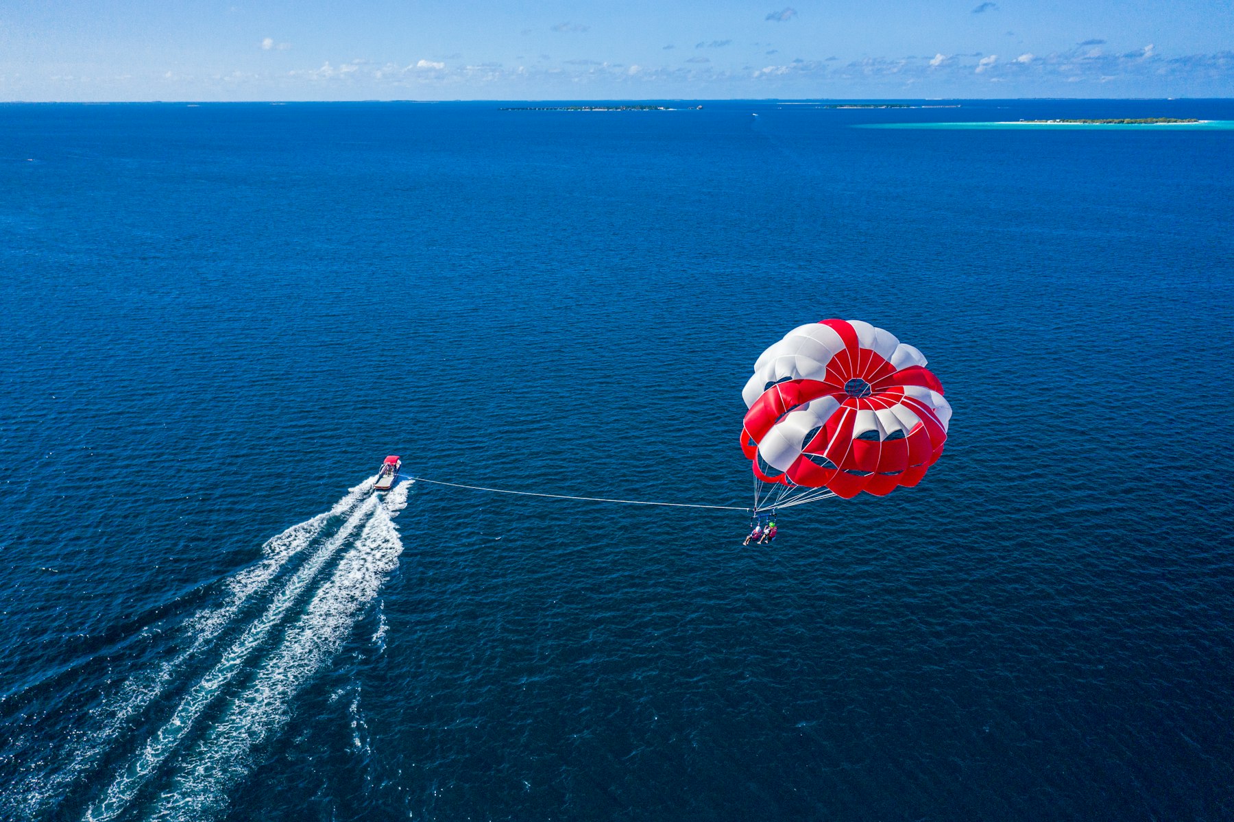 Parasailing on a tow line out over the Red Sea