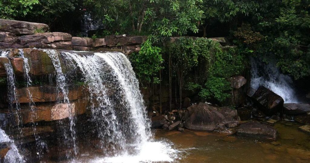 Visit The Kbal Chhay Waterfall For A Refreshing Dip In Nature